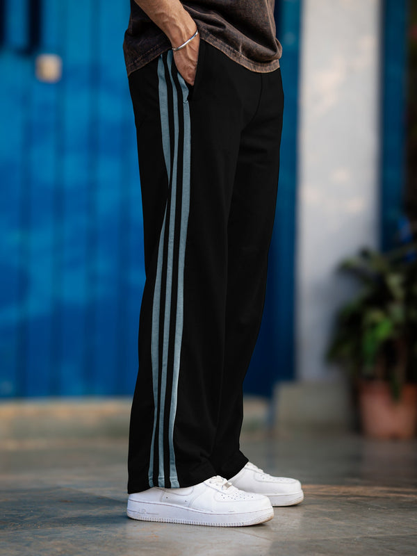 Black baggy taped pants for men