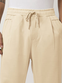 Cream Solid Balloon Fit Trackpant