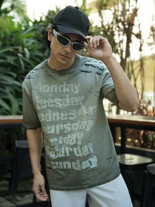Men’s grey oversized cotton T-shirt featuring printed design, relaxed fit, and breathable fabric for everyday wear